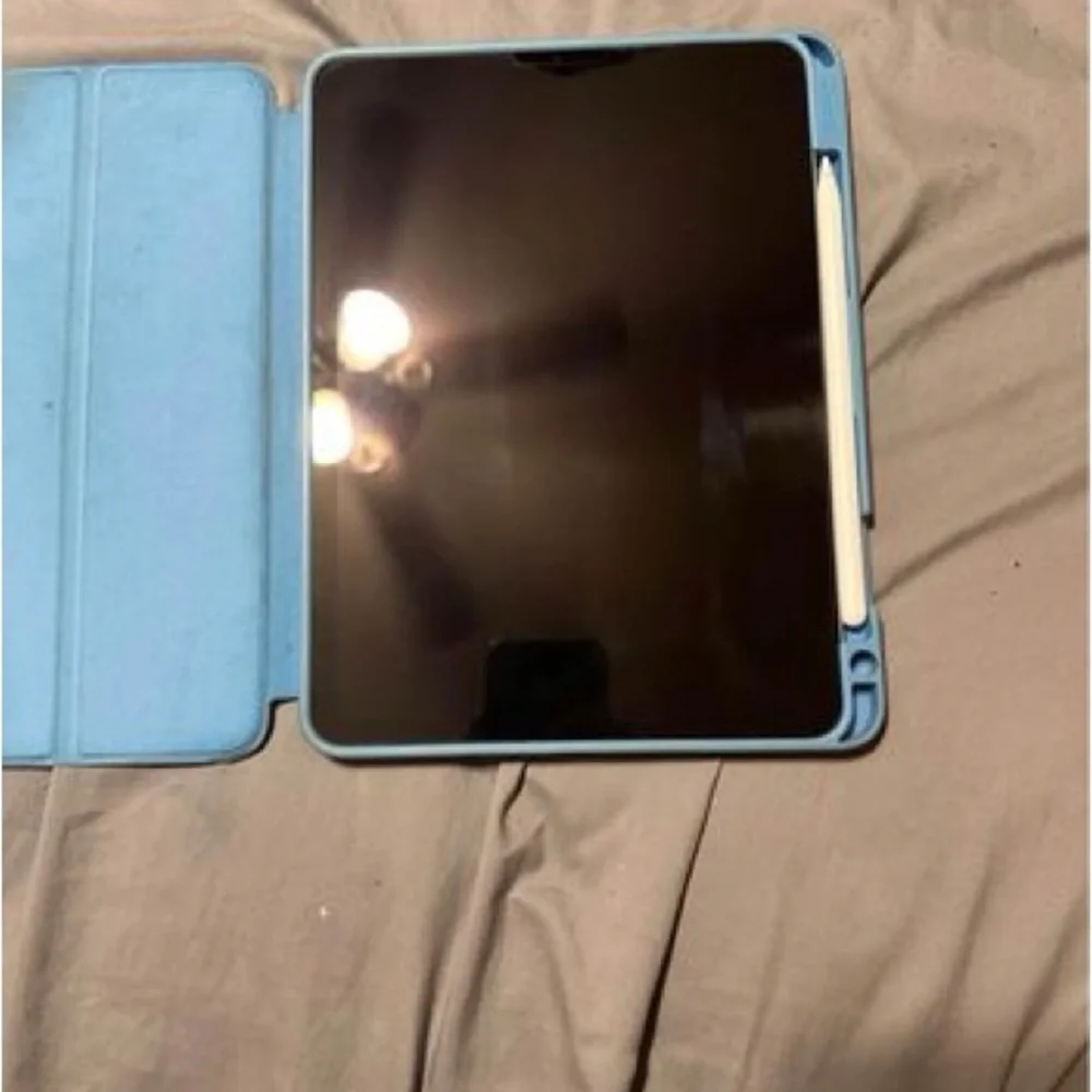Apple iPad Air 2020 with Apple Pencil 2nd generation and case.